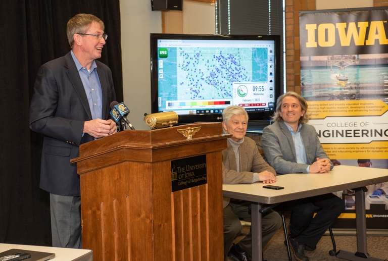 Larry Weber addresses the IIHR CIROH members at a podium