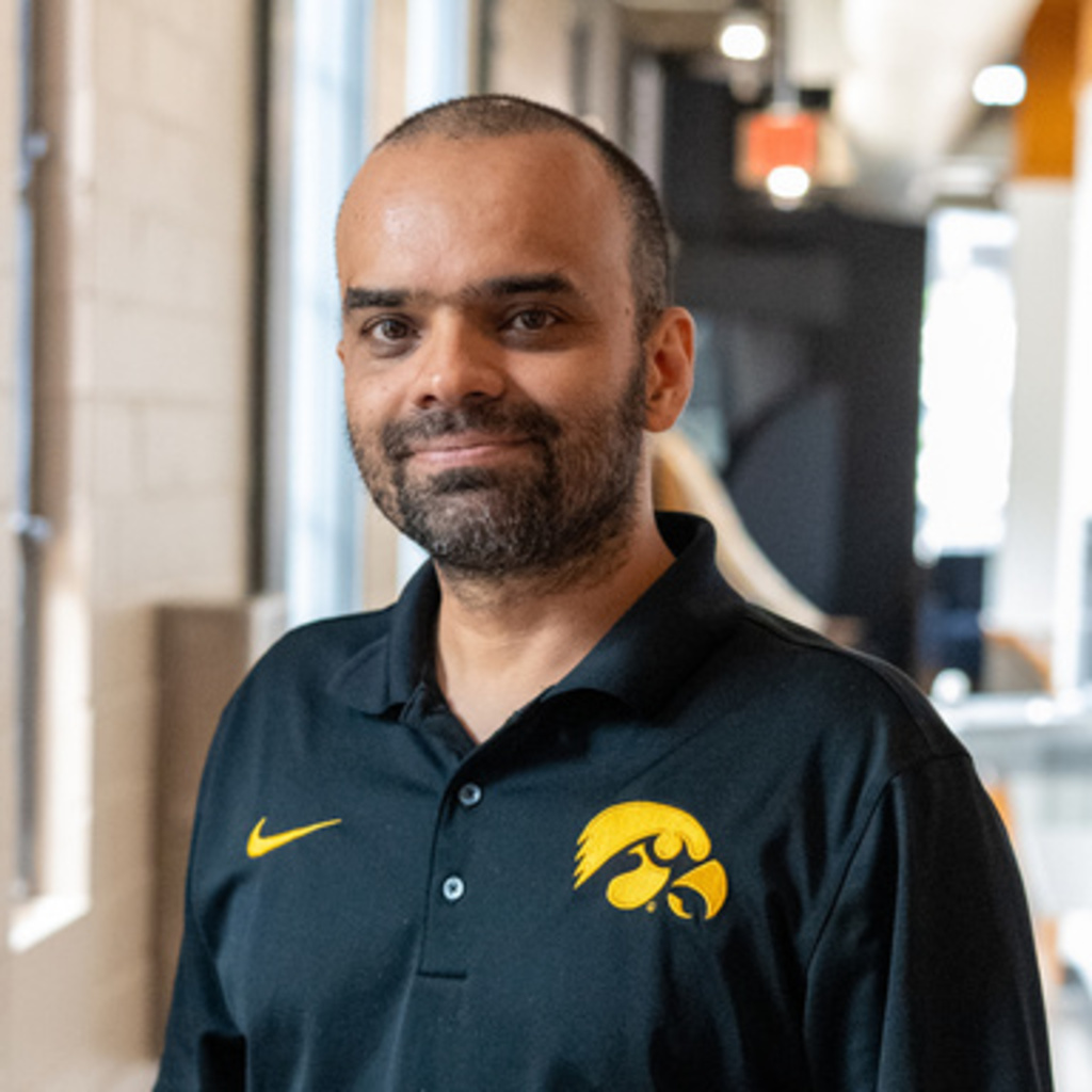 Ruben Molina smiles in the SHL hallway